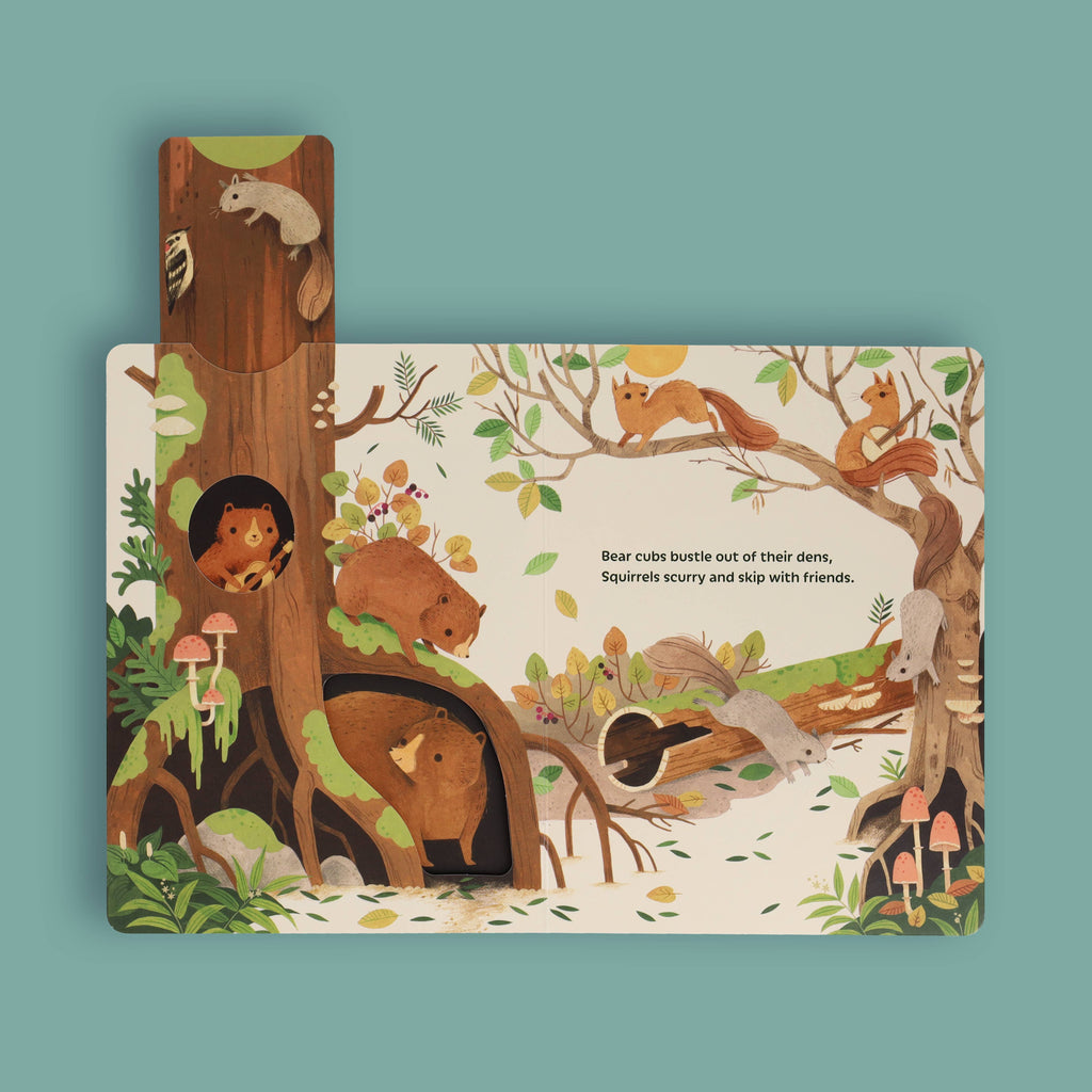 Children's book with bear cubs, squirrels, and woodland animals in a cozy forest scene