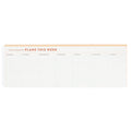Weekly planner pad with days of the week printed on a white background