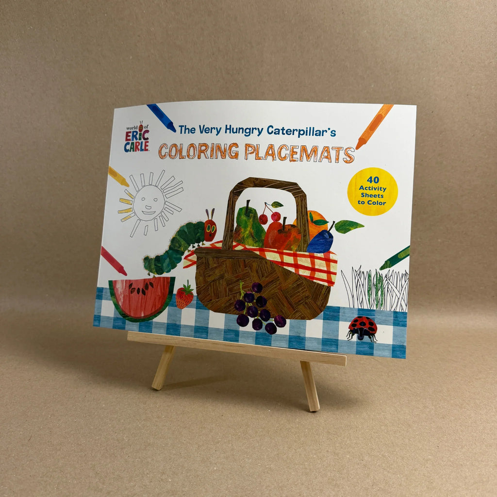 Coloring placemats for 'The Very Hungry Caterpillar' on a brown background