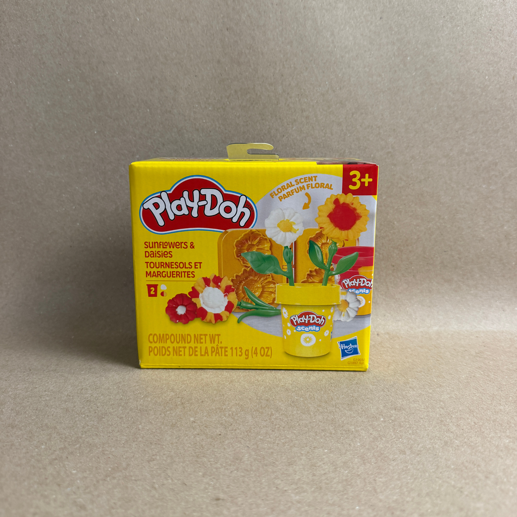Play-Doh flower set packaging on a beige background