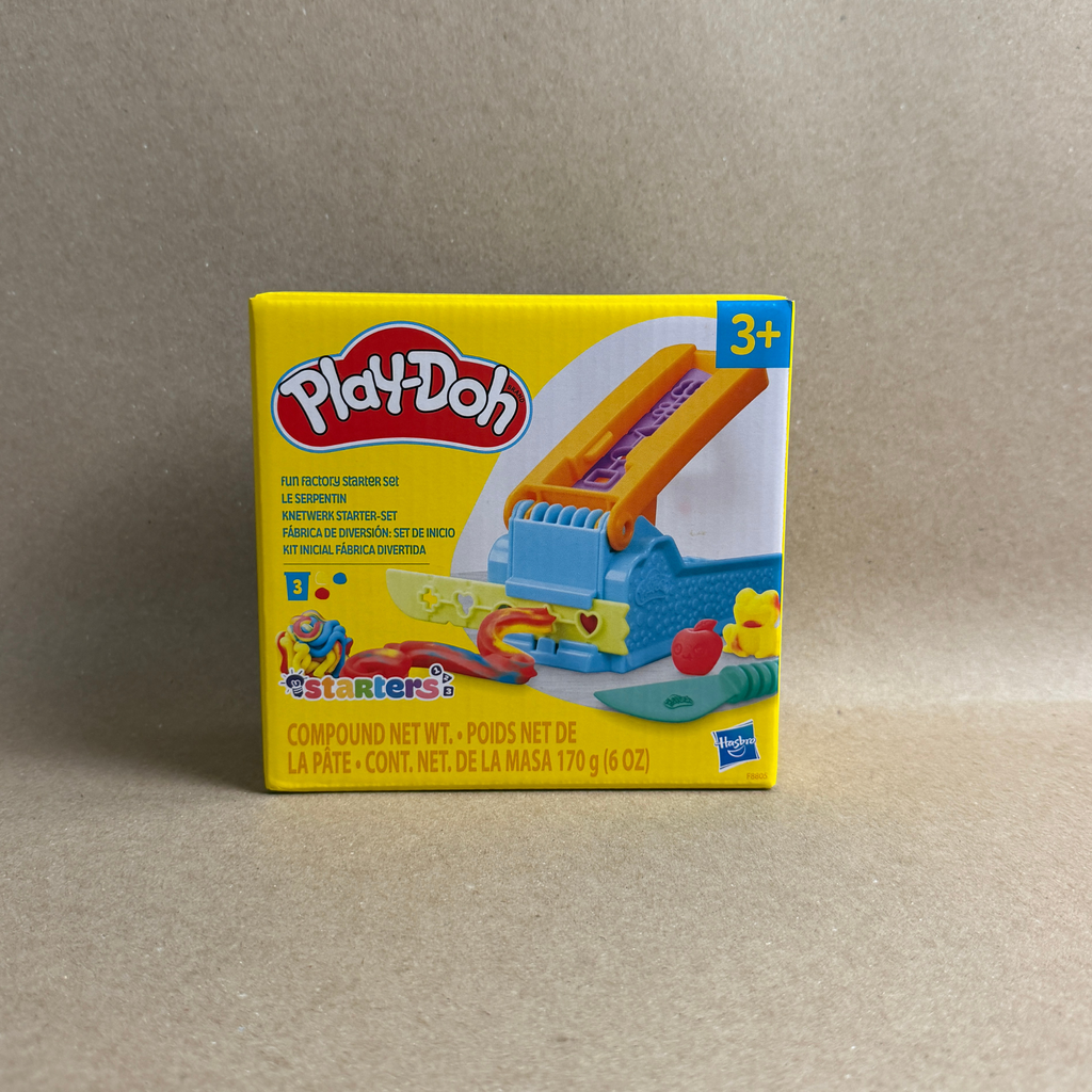 Play-Doh packaging on a beige background