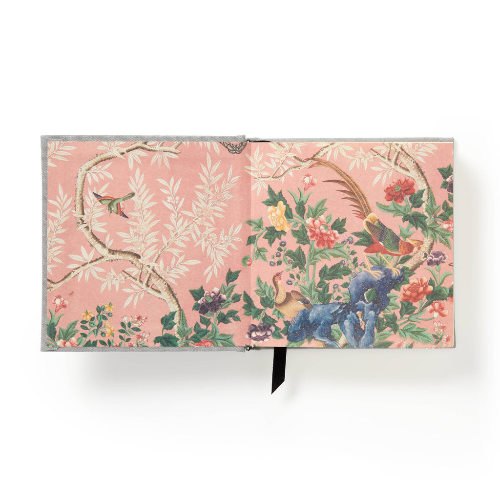 Floral notebook with birds and blossoms, perfect for planners and cozy reads