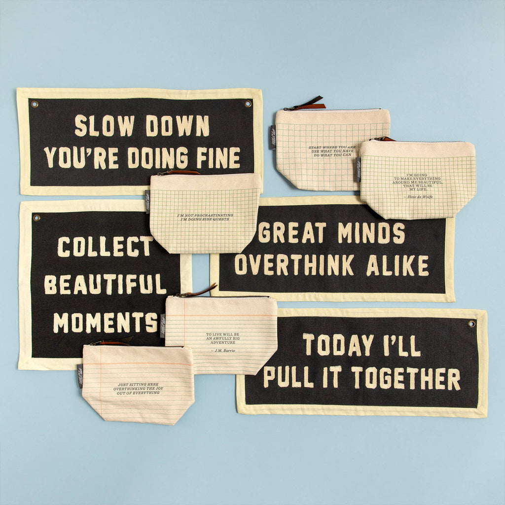 Motivational canvas pouches & wall banners with quotes like 'Slow Down You're Doing Fine' for cozy, intentional living