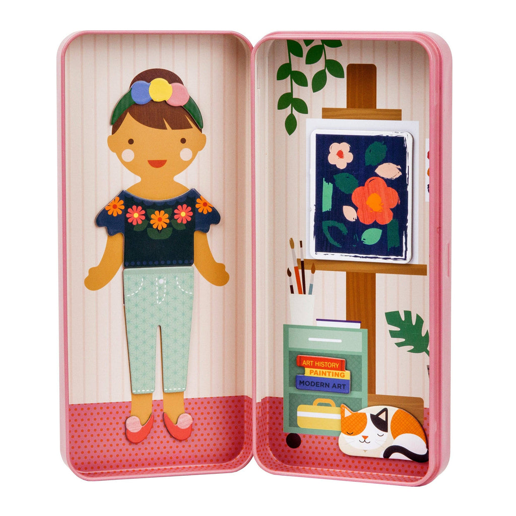 Frida Kahlo paper doll in pink tin with art studio scene, flowers, cat, and books for creative play