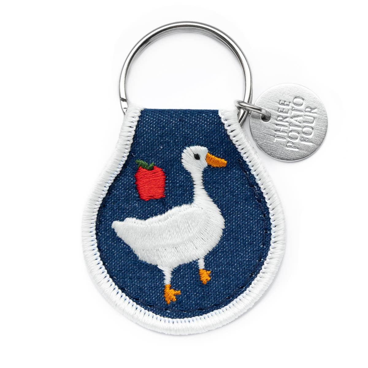Keychain with a goose design on a blue background