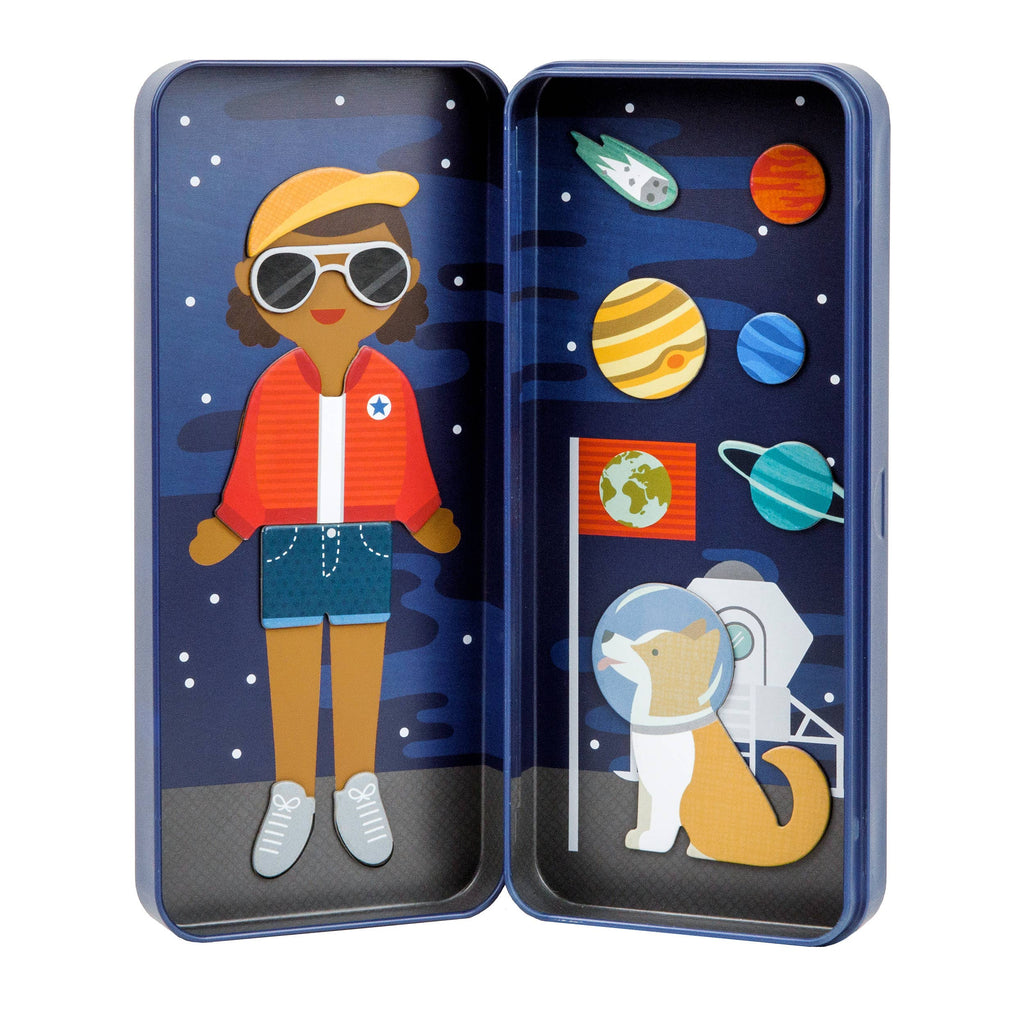 Space-themed magnetic dress-up toy with astronaut girl, planets, and dog in tin case for kids' imaginative play