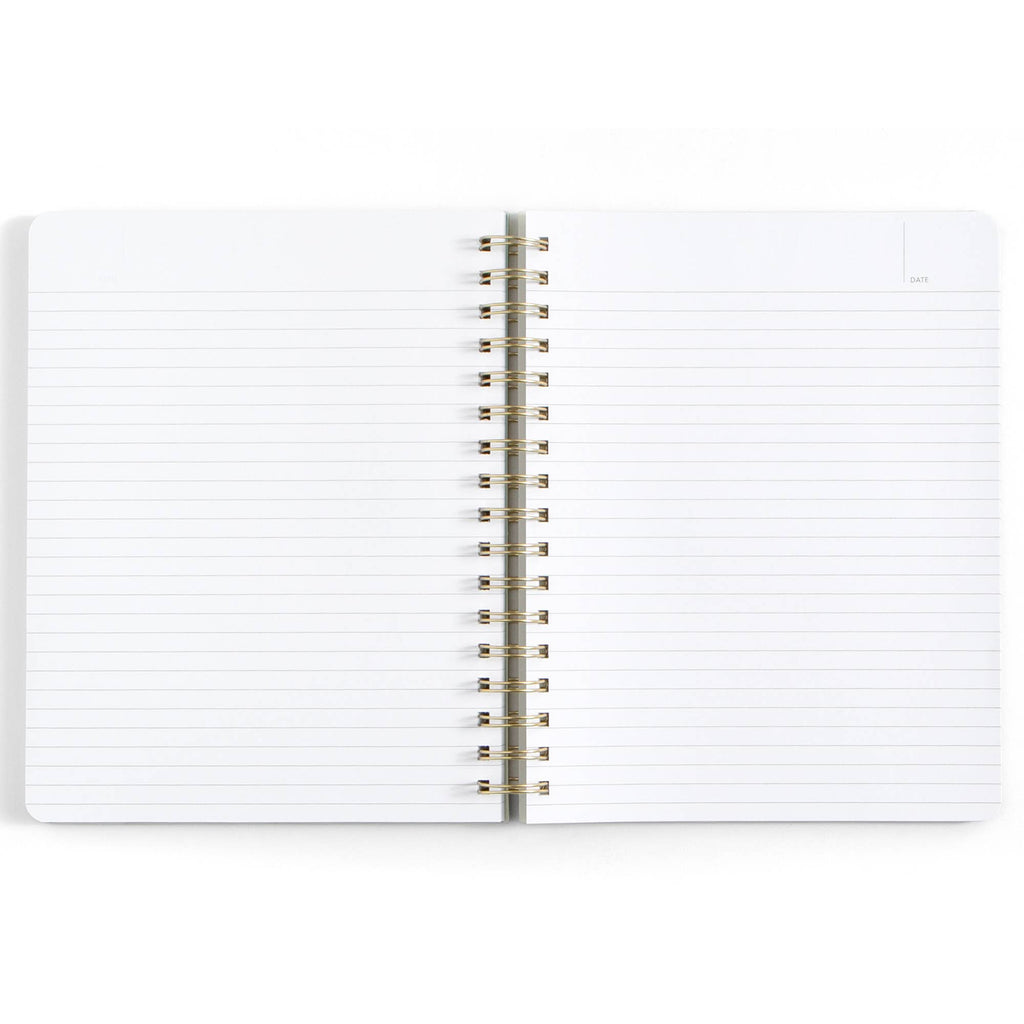 Open notebook with spiral binding on a white background