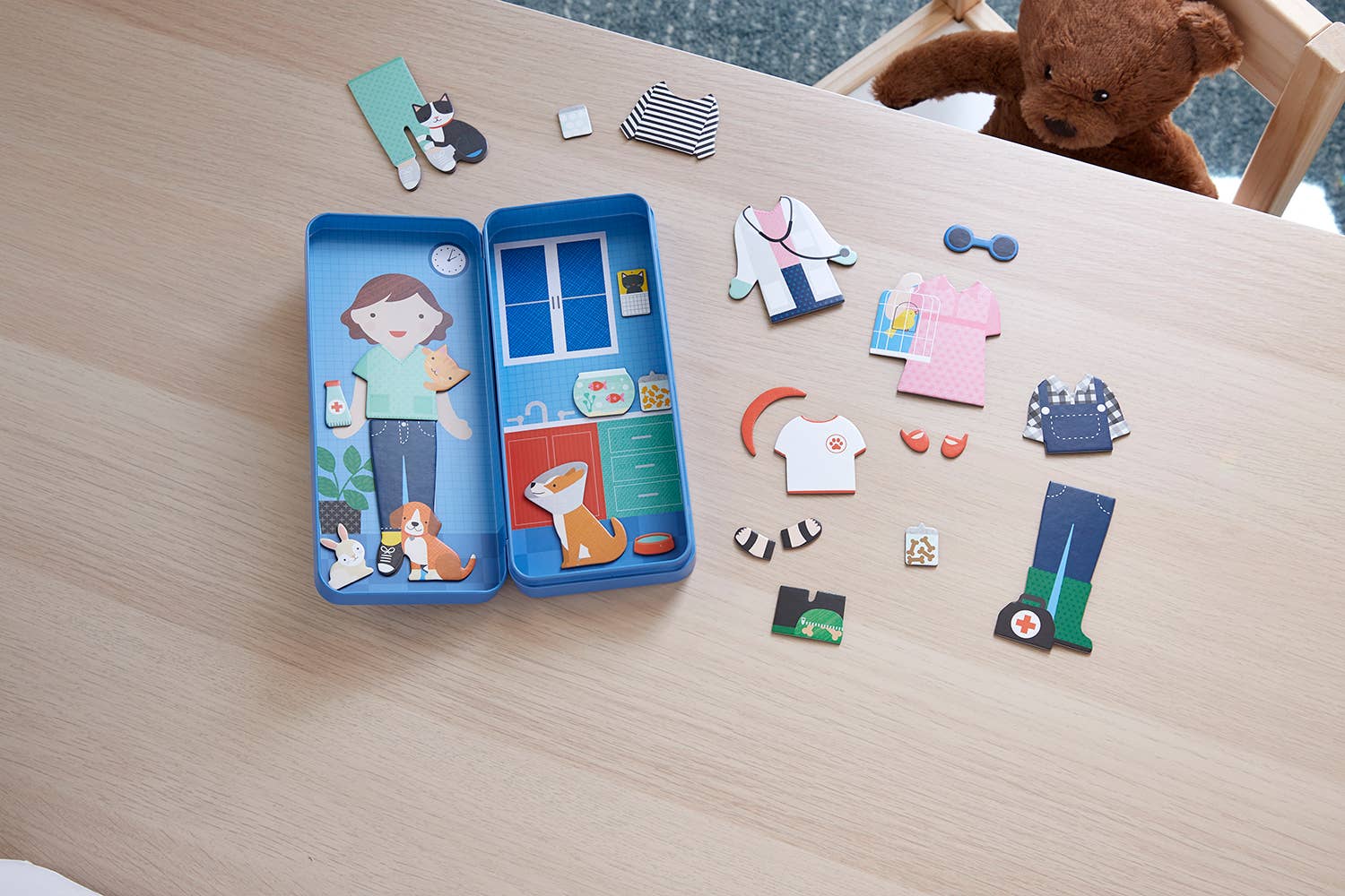Interactive vet play set with magnetic dress-up pieces, perfect for imaginative kids' play and learning.