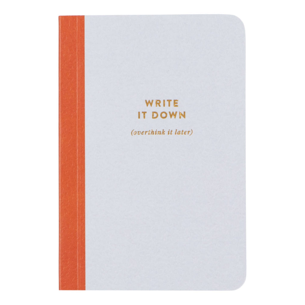 Notebook with orange strap and 'Write it Down (overthink it later)' text on a white background