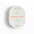 Round container with 'In My Book Club Era' text on a white background