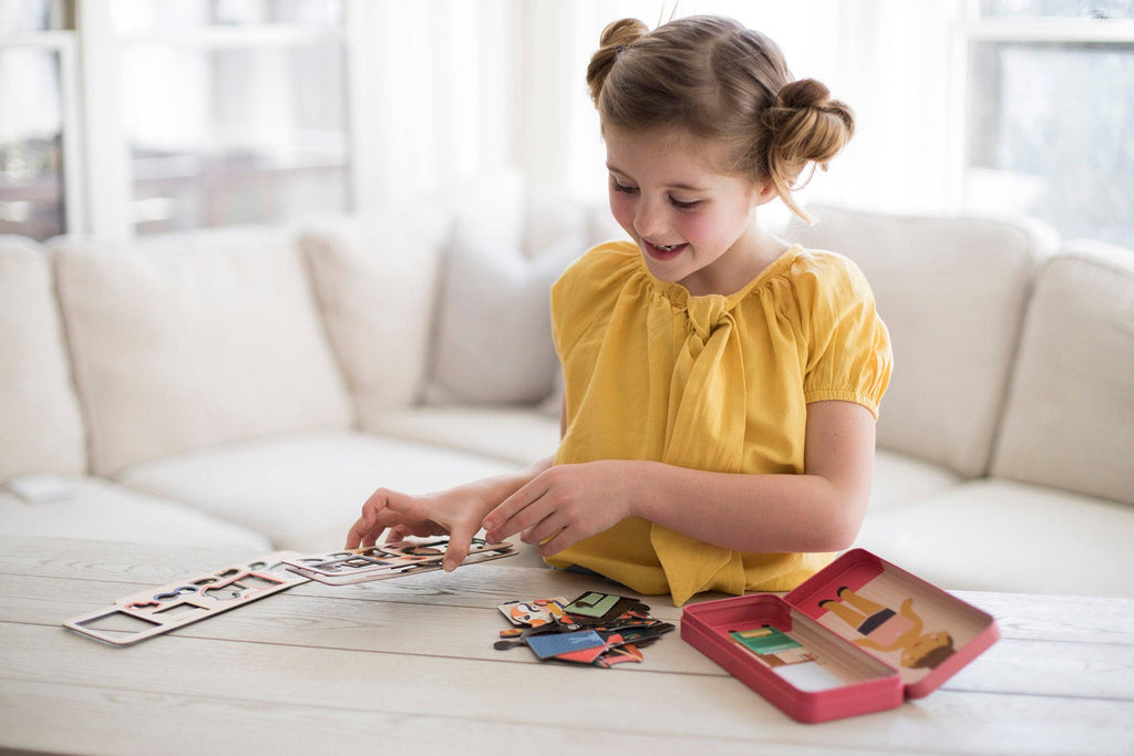 Child playing with wooden puzzle toy on table, cozy living room setting for intentional play